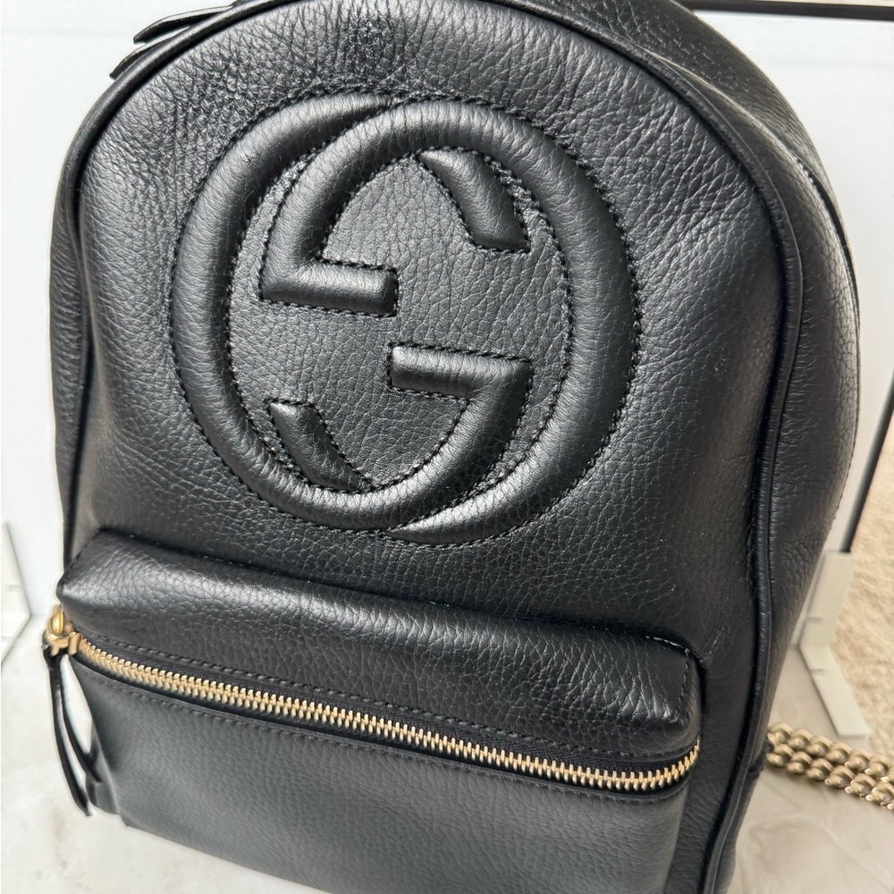 Gucci Black Leather Backpack with Gold Accents